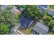 Housetop view showing a single Gathering home with driveway and surrounding houses at 2220 Crystal Grove Ln, Lakeland, FL 33801