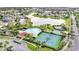 Community features pool, tennis courts, and playground at 2650 Patrician Cir, Kissimmee, FL 34746