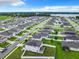 Aerial view of houses in a neighborhood near a lake at 592 Lake Smart Blvd, Winter Haven, FL 33881