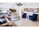 Open living room with comfortable seating and kitchen view at 592 Lake Smart Blvd, Winter Haven, FL 33881