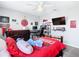Bedroom with a double bed, desk, and large TV at 592 Lake Smart Blvd, Winter Haven, FL 33881