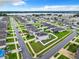 Aerial view of a residential neighborhood with lake access at 592 Lake Smart Blvd, Winter Haven, FL 33881