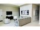Relaxing living room with sectional sofa and large TV at 7740 Sandy Ridge Dr # 226, Kissimmee, FL 34747