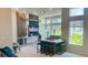 Community room with TV, seating area, and bar at 7740 Sandy Ridge Dr # 226, Kissimmee, FL 34747