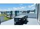 Private rooftop terrace with city views and outdoor dining at 7740 Sandy Ridge Dr # 226, Kissimmee, FL 34747