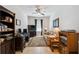 Home office with built-in shelving and desk at 742 San Joaquin Rd, Poinciana, FL 34759