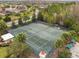 Community tennis courts with surrounding trees and landscaping at 742 San Joaquin Rd, Poinciana, FL 34759