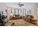 Comfortable living room with two sofas and a large TV at 742 San Joaquin Rd, Poinciana, FL 34759