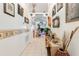 Long hallway with decorative wall accents and views to living areas at 170 Thornbury Dr, Kissimmee, FL 34744