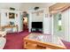 Living room with a view to backyard and plenty of natural light at 170 Thornbury Dr, Kissimmee, FL 34744