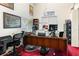 Home office with a large desk and ample space for work at 170 Thornbury Dr, Kissimmee, FL 34744