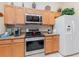 Kitchen with stainless steel appliances and ample cabinetry at 170 Thornbury Dr, Kissimmee, FL 34744