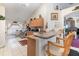 Kitchen with breakfast bar and view to dining area at 170 Thornbury Dr, Kissimmee, FL 34744