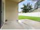 Covered patio with access to a grassy backyard at 170 Thornbury Dr, Kissimmee, FL 34744