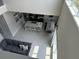 Open concept living space with kitchen, dining, and living areas visible at 7760 Sandy Ridge Dr # 214, Kissimmee, FL 34747