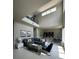 Spacious living room showcasing high ceilings and an open floor plan at 7760 Sandy Ridge Dr # 214, Kissimmee, FL 34747