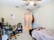 Bedroom with a twin bed, desk, and chair at 3917 Pemberly Pines Cir, Saint Cloud, FL 34769