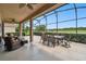 Spacious screened patio overlooking lake at 154 Rancho Mirage Dr, Kissimmee, FL 34759