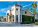 Exterior of charming Mediterranean-style shop with lush landscaping at 154 Rancho Mirage Dr, Kissimmee, FL 34759
