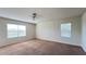 Bright bedroom with neutral walls and carpet flooring at 108 Country Walk Cir, Davenport, FL 33837