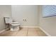 Clean and simple bathroom with neutral tile flooring at 108 Country Walk Cir, Davenport, FL 33837