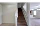 Staircase leading to the second floor with carpeted steps at 108 Country Walk Cir, Davenport, FL 33837