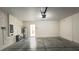 Attached garage with extra storage space at 108 Country Walk Cir, Davenport, FL 33837