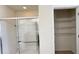 Bathroom with shower and a linen closet at 108 Country Walk Cir, Davenport, FL 33837