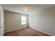 Simple bedroom with carpeted floor and a window at 108 Country Walk Cir, Davenport, FL 33837