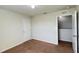 Bright bedroom with carpet, closet, and access to loft area at 108 Country Walk Cir, Davenport, FL 33837