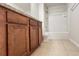 Bathroom featuring a vanity with wood cabinets and a tub at 108 Country Walk Cir, Davenport, FL 33837