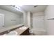 Clean bathroom with a shower/tub, double vanity, and toilet at 108 Country Walk Cir, Davenport, FL 33837