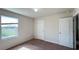 Spacious bedroom with neutral walls and carpet flooring at 108 Country Walk Cir, Davenport, FL 33837