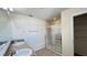 Bathroom with double vanity, shower, and linen closet at 108 Country Walk Cir, Davenport, FL 33837