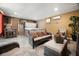 Basement features a hot tub and comfortable wicker furniture for relaxation at 5051 Plymouth Turtle Cir, St Cloud, FL 34772