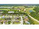 Aerial view of homes near a golf course at 5051 Plymouth Turtle Cir, St Cloud, FL 34772