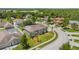 Two-story house situated in a residential neighborhood with a golf course nearby at 5051 Plymouth Turtle Cir, St Cloud, FL 34772