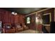 Home theater with red recliner chairs and a popcorn machine at 5051 Plymouth Turtle Cir, St Cloud, FL 34772