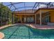 Inviting pool area with covered lanai, offering ample space for relaxation and entertainment at 4962 Lazy Oaks Way, St Cloud, FL 34771