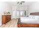 Spacious main bedroom with water views and hardwood floors at 4962 Lazy Oaks Way, St Cloud, FL 34771