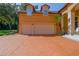 Two-car garage with stamped concrete driveway at 4962 Lazy Oaks Way, St Cloud, FL 34771