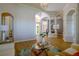 Spacious living room with hardwood floors and large windows at 4962 Lazy Oaks Way, St Cloud, FL 34771