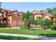 Beautiful two-story home with lush landscaping and a two-car garage at 4962 Lazy Oaks Way, St Cloud, FL 34771