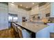 Gourmet kitchen with white cabinets, stainless steel appliances, and large island at 4962 Lazy Oaks Way, St Cloud, FL 34771