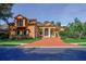 Stunning two-story home with terracotta roof and landscaped yard at 4962 Lazy Oaks Way, St Cloud, FL 34771