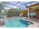 Relaxing screened pool and patio area, perfect for outdoor enjoyment at 4962 Lazy Oaks Way, St Cloud, FL 34771