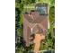 Top-down view of house showcasing its roofline and pool at 4962 Lazy Oaks Way, St Cloud, FL 34771
