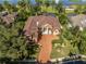 Large home with a spacious driveway and a beautiful water view at 4962 Lazy Oaks Way, St Cloud, FL 34771