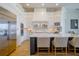 Spacious kitchen with white cabinets, large island, and high-end appliances at 4962 Lazy Oaks Way, St Cloud, FL 34771