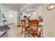 Kitchen with breakfast bar and view into living room at 961 Whisler Ct, St Cloud, FL 34769
